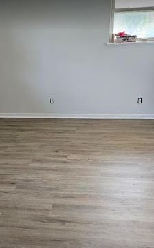 Completed light wood-look flooring installation